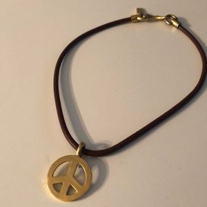 Leather and brass Coach peace sign necklace